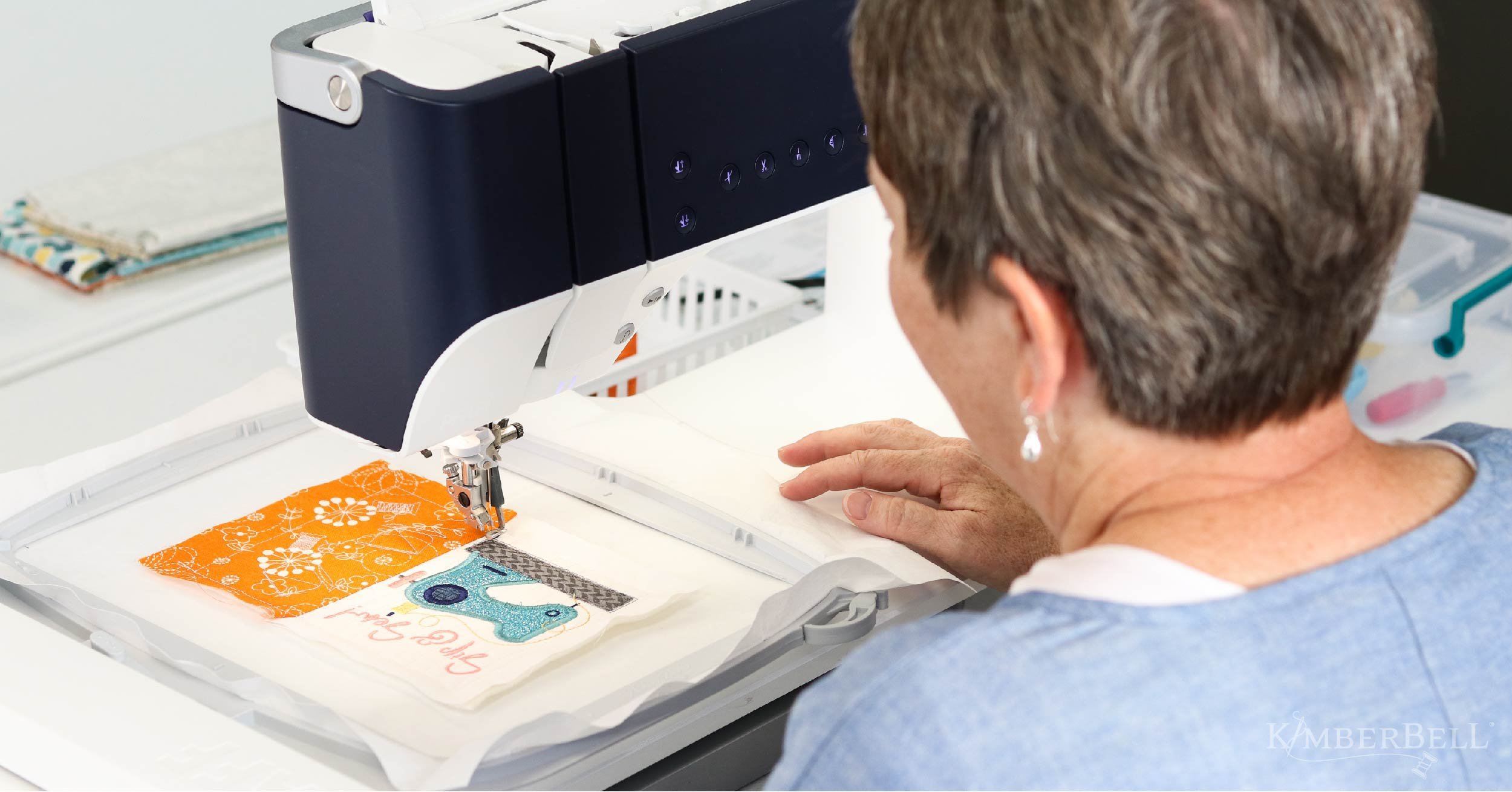 PIcture of woman at embroidery machine